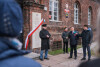 Odsłonięcie odnowionych tablic upamiętniających obrońców Poczty Polskiej 